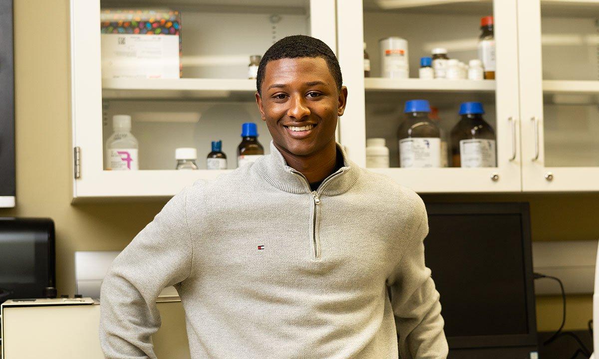 Student standing in lab